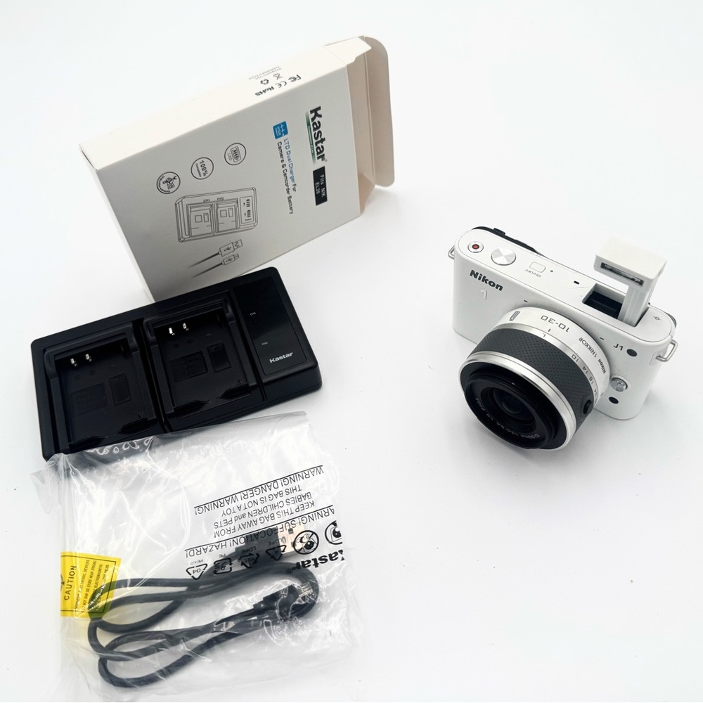 Nikon White Digital Camera with Accessories